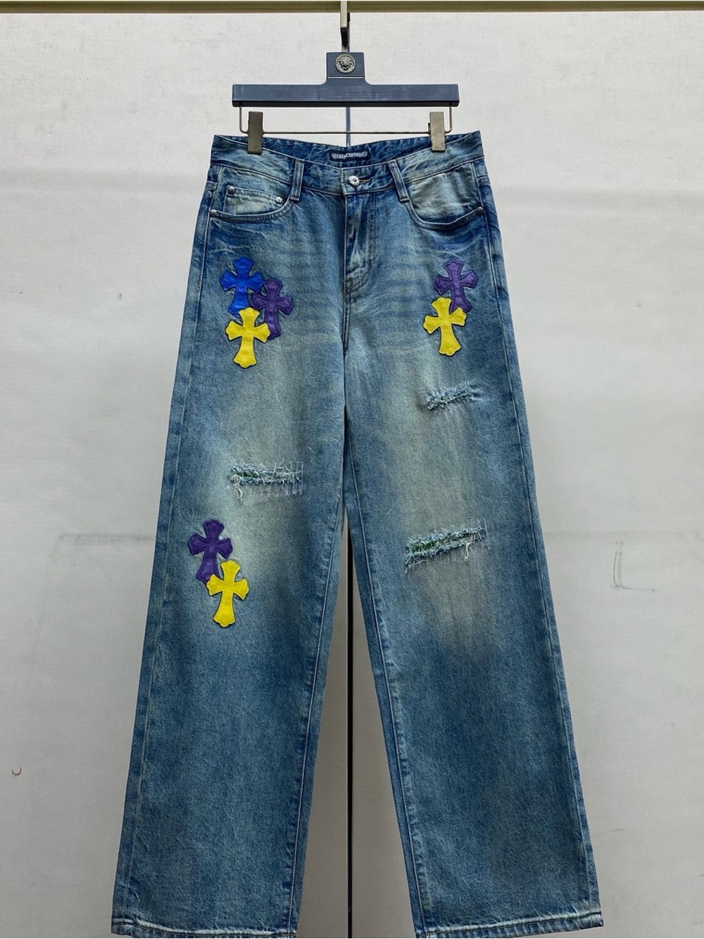 Chrome Hearts Blue Wide-Leg Jeans with Purple & Yellow Cross Appliqués